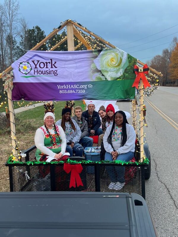 Members of York Housing Authority in a Christmas Parade float.